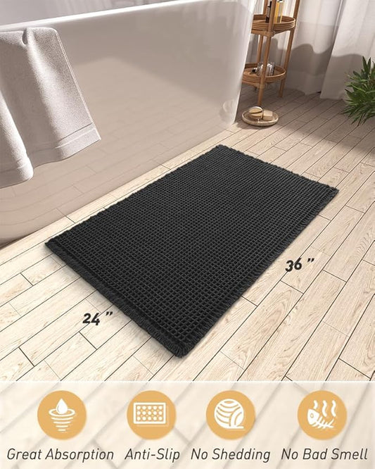 AMOAMI Upgraded Waffle Bath Mat, Super Absorbent Non Slip Bath Mats for Bathroom Floor, Machine Washable Bathroom Rugs with Tassels, Rubber Backed Bathroom Mats, Ultra Soft, 24" x 36", Black