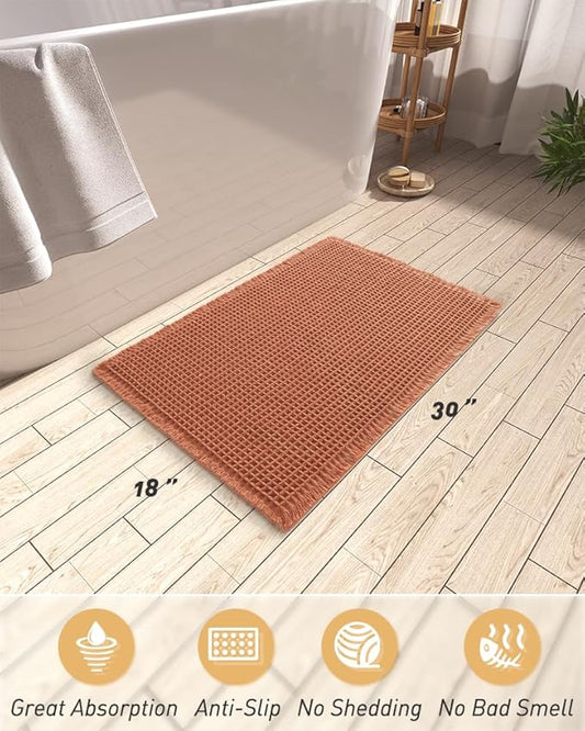 AMOAMI Upgraded Waffle Bath Mat, Super Absorbent Non Slip Bath Mats for Bathroom Floor, Machine Washable Bathroom Rugs with Tassels, Rubber Backed Bathroom Mats, Ultra Soft, 18" x 30", Dirty Orange