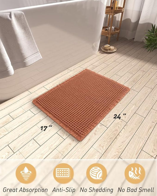 AMOAMI Upgraded Waffle Bath Mat, Super Absorbent Non Slip Bath Mats for Bathroom Floor, Machine Washable Bathroom Rugs with Tassels, Rubber Backed Bathroom Mats, Ultra Soft, 17" x 24", Dirty Orange