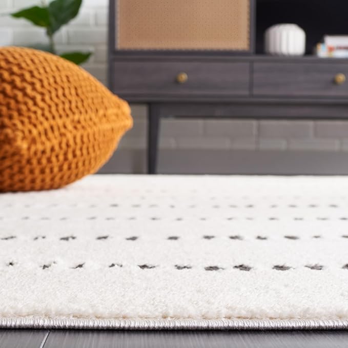 SAFAVIEH Melody Collection Area Rug - 10' x 14', Ivory/Black, Geometric Design, Ideal for High Traffic Areas in Living Room, Bedroom, Dining (MEL114A)