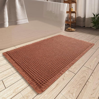AMOAMI Upgraded Waffle Bath Mat, Super Absorbent Non Slip Bath Mats for Bathroom Floor, Machine Washable Bathroom Rugs with Tassels, Rubber Backed Bathroom Mats, Ultra Soft, 20" x 32", Dirty Orange