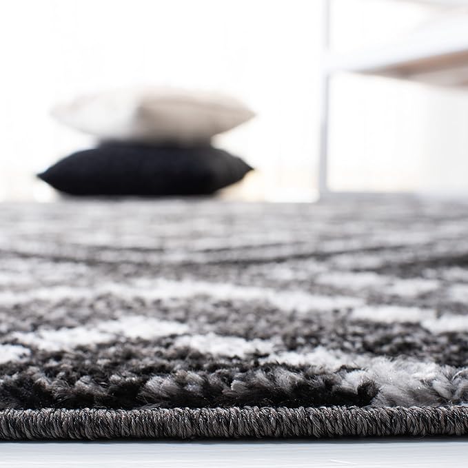 SAFAVIEH Adirondack Collection Accent Rug - 2'6" x 4', Black & Ivory, Modern Distressed Design, Non-Shedding & Easy Care, Ideal for High Traffic Areas in Entryway, Living Room, Bedroom (ADR131A)