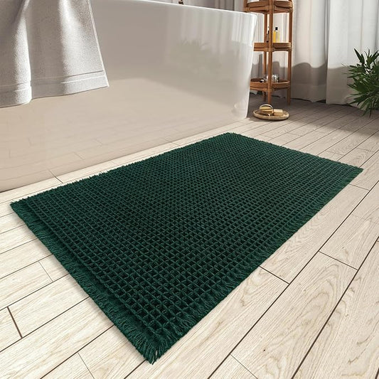 AMOAMI Upgraded Waffle Bath Mat, Super Absorbent Non Slip Bath Mats for Bathroom Floor, Machine Washable Bathroom Rugs with Tassels, Rubber Backed Bathroom Mats, Ultra Soft, 17" x 24", Dark Green