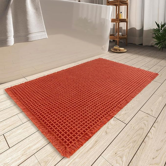 AMOAMI Upgraded Waffle Bath Mat, Super Absorbent Non Slip Bath Mats for Bathroom Floor, Machine Washable Bathroom Rugs with Tassels, Rubber Backed Bathroom Mats, Ultra Soft, 18" x 30", Orange