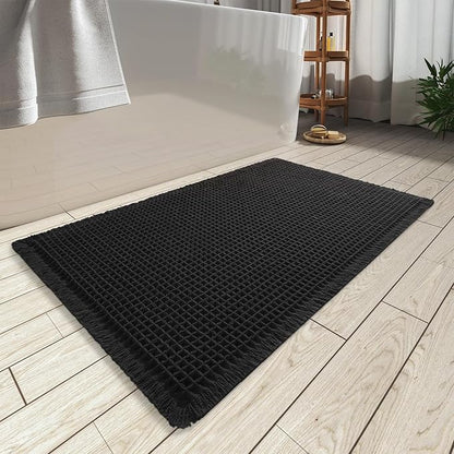 AMOAMI Upgraded Waffle Bath Mat, Super Absorbent Non Slip Bath Mats for Bathroom Floor, Machine Washable Bathroom Rugs with Tassels, Rubber Backed Bathroom Mats, Ultra Soft, 18" x 30", Black