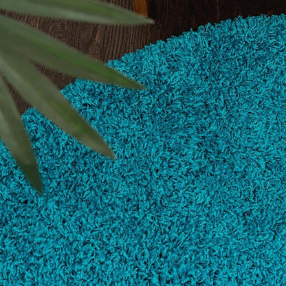 Unique Loom Solid Shag Collection Area Rug (5' 1" x 8' Oval, Turquoise)