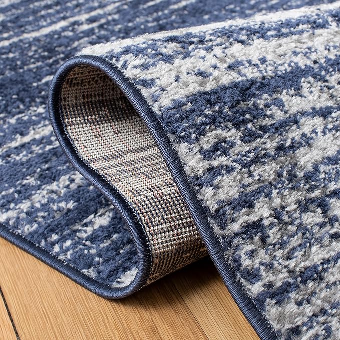 SAFAVIEH Adirondack Collection Area Rug - 5'5" x 7'7", Navy & Grey, Modern Ombre Design, Non Shedding & Easy to Clean, Ideal for Living Room, Bedroom, Office, Dining Space (ADR113E)