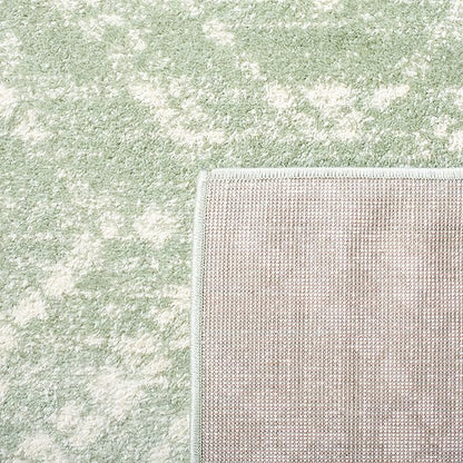 SAFAVIEH Adirondack Collection Accent Rug - 4' x 6', Green & Ivory, Modern Distressed Design, Non-Shedding & Easy Care, Ideal for High Traffic Areas in Entryway, Living Room, Bedroom (ADR131Y)