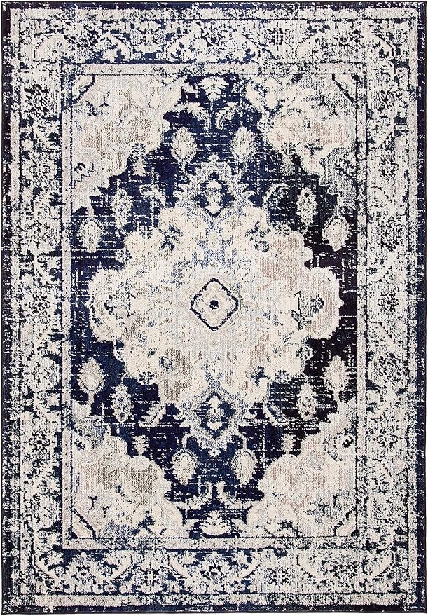 SAFAVIEH Monaco Collection Area Rug - 5'1" x 7'7", Ivory & Navy, Boho Chic Medallion Distressed Design, Non-Shedding & Easy Care, Ideal for High Traffic Areas in Living Room, Bedroom (MNC243C)