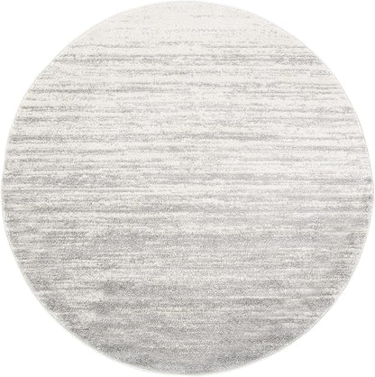 SAFAVIEH Adirondack Collection Area Rug - 11' Round, Ivory & Silver, Modern Ombre Design, Non Shedding & Easy to Clean, Ideal for Living Room, Bedroom, Office, Dining Space (ADR113B)