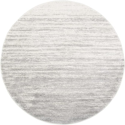 SAFAVIEH Adirondack Collection Area Rug - 7' Round, Ivory & Silver, Modern Ombre Design, Non Shedding & Easy to Clean, Ideal for Living Room, Bedroom, Office, Dining Space (ADR113B)