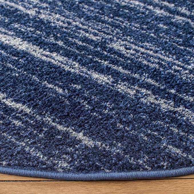 SAFAVIEH Adirondack Collection Area Rug - 4' Round, Navy & Ivory, Modern Ombre Design, Non Shedding & Easy to Clean, Ideal for Living Room, Bedroom, Office, Dining Space (ADR113N)