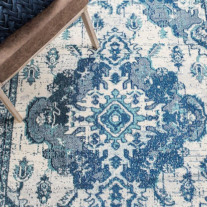 SAFAVIEH Monaco Collection Area Rug - 8' x 10', Ivory & Blue, Boho Chic Medallion Distressed Design, Non-Shedding & Easy Care, Ideal for High Traffic Areas in Living Room, Bedroom (MNC243A)